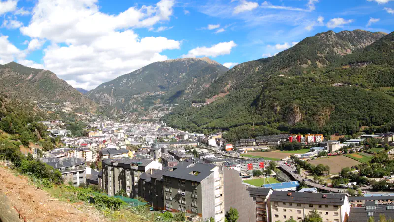 Andorra la Vella spread across a narrow valley between green mountain slopes