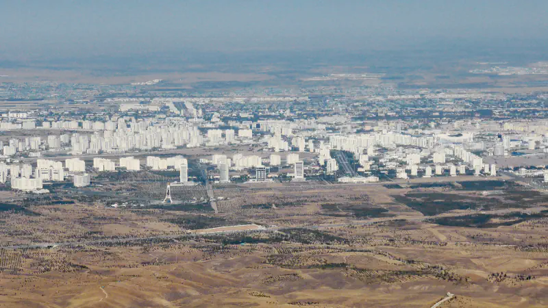 Wide view of Ashgabat buildings and streets from above