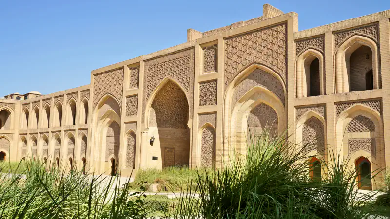 Brick arches and patterned panels around the Mustansiriyya courtyard in Baghdad