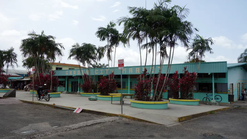 Belmopan market building and nearby streets under a bright sky