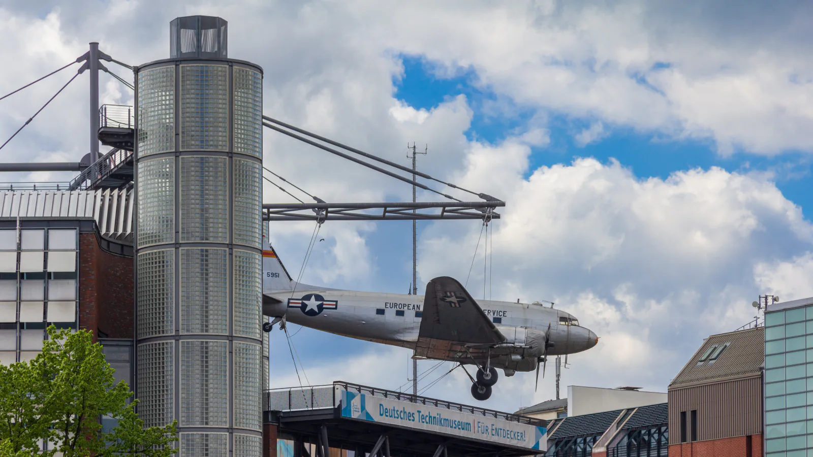 Deutsches Technikmuseum exterior with a suspended aircraft in Berlin