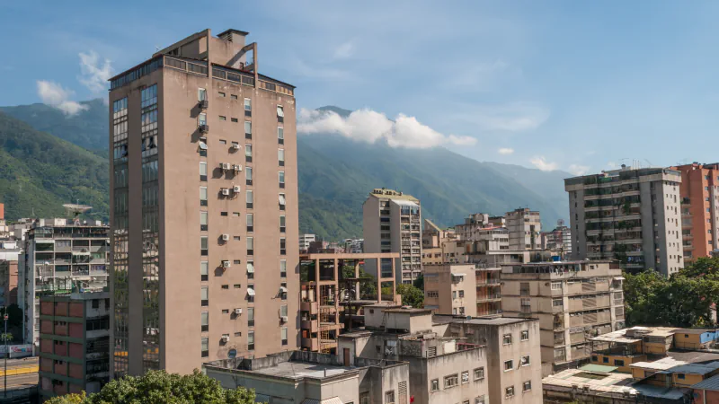 Caracas apartment buildings with green mountain slopes behind them in 2012