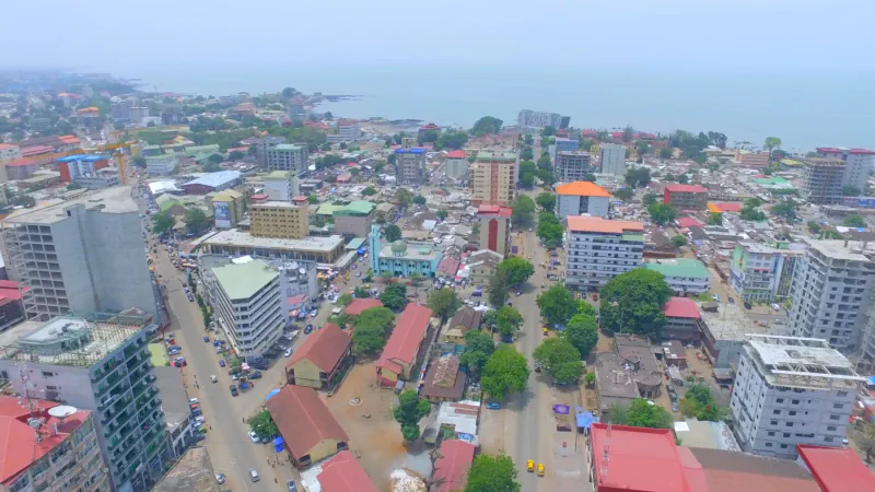 Rooftops, streets and shoreline of Kaloum in Conakry