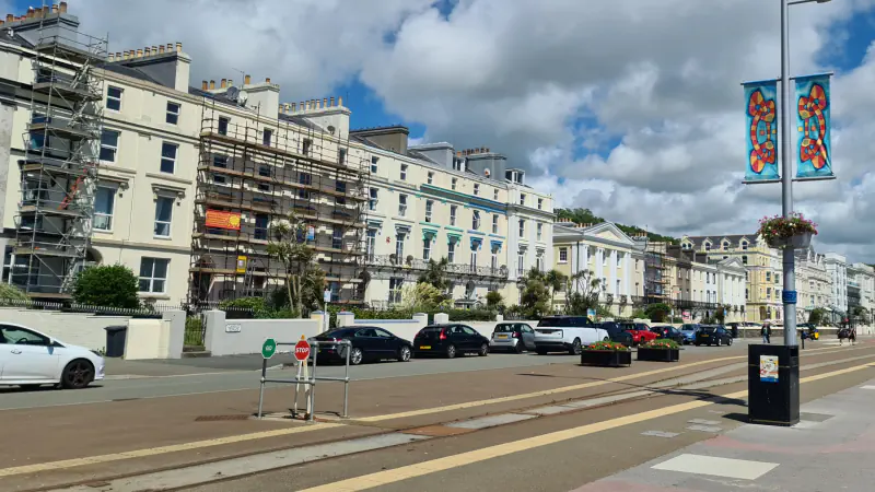 Tram rails and buildings along the Central Promenade in Douglas