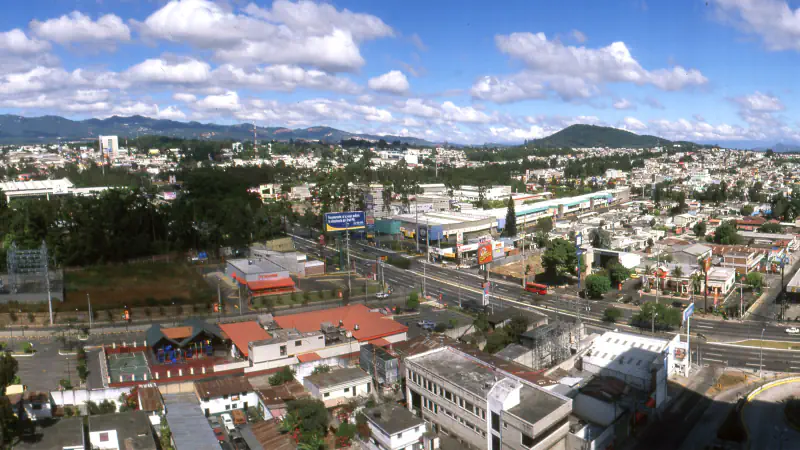 Streets and distant hills of Guatemala City seen from above