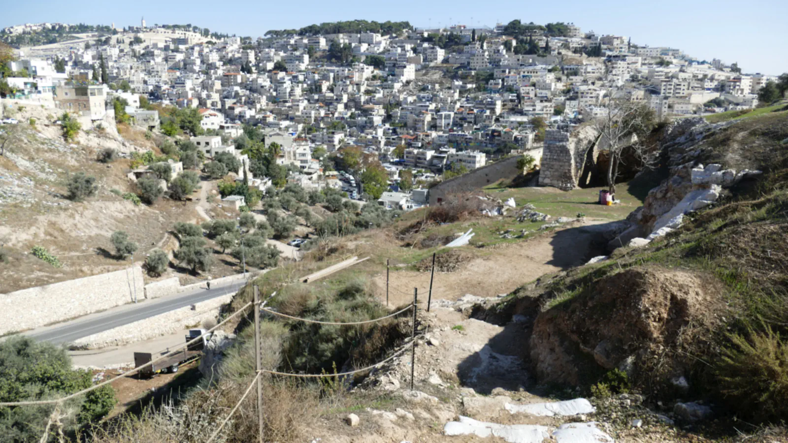 A hillside valley and Jerusalem buildings viewed from above