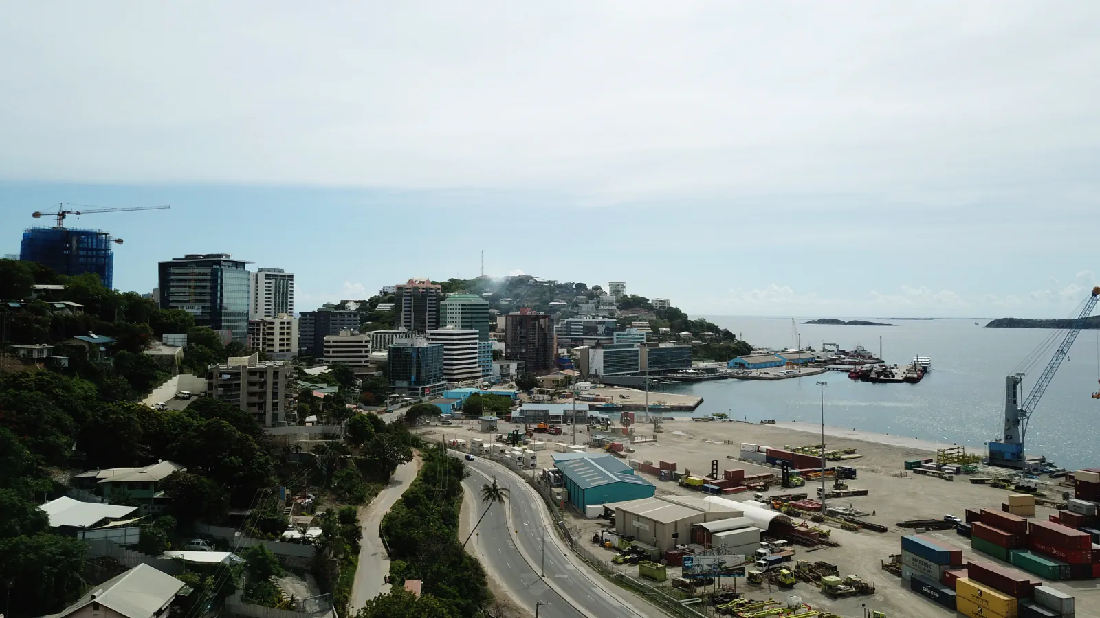 Elevated view across Port Moresby’s downtown buildings and harbour