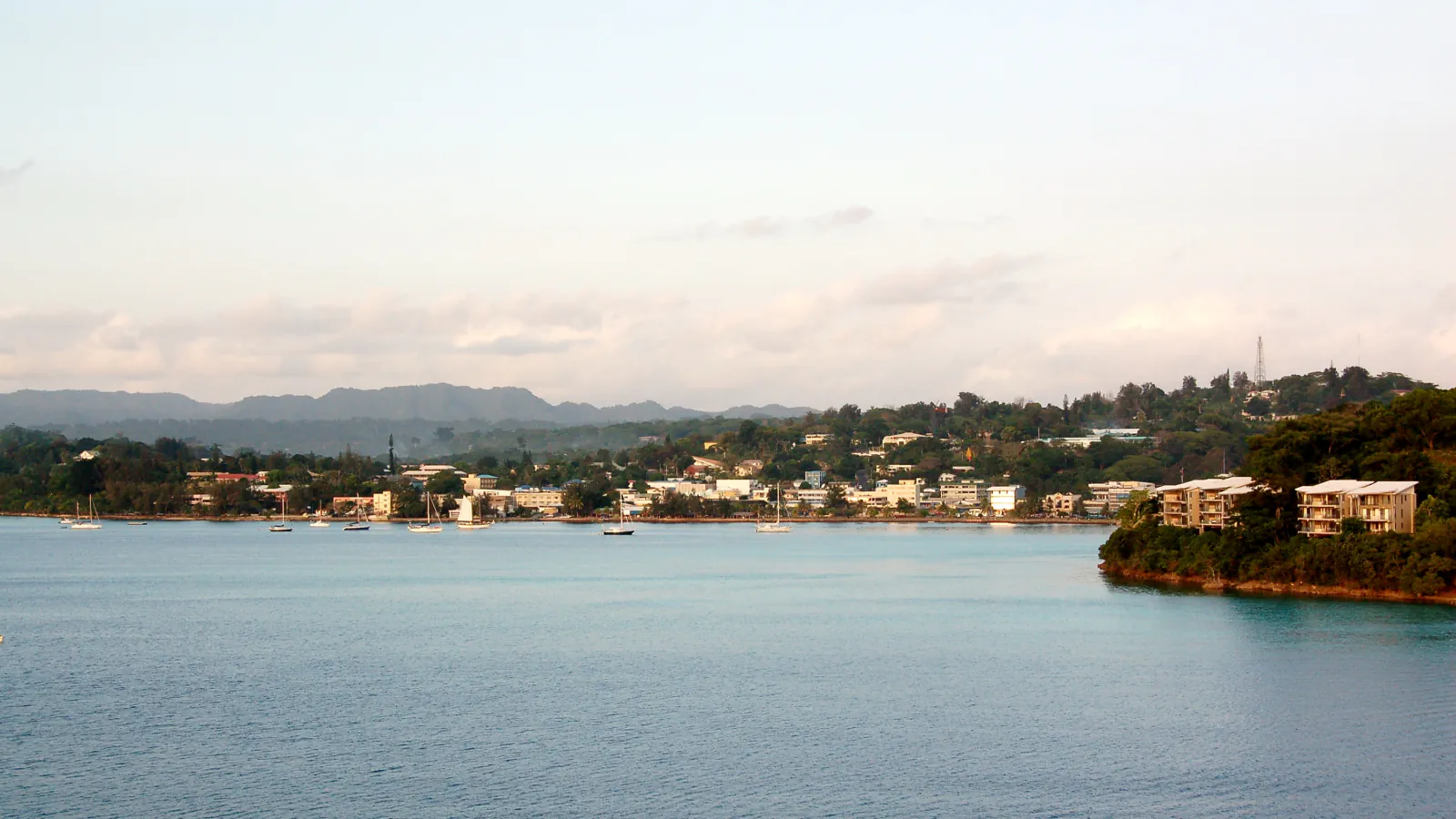 Port Vila waterfront, boats and hillside buildings photographed in 2007
