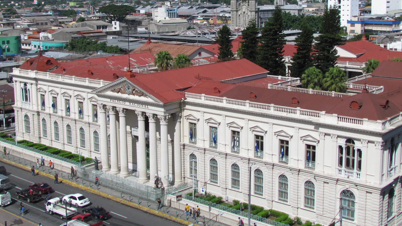 National Palace façade with its central portico beside a street in San Salvador