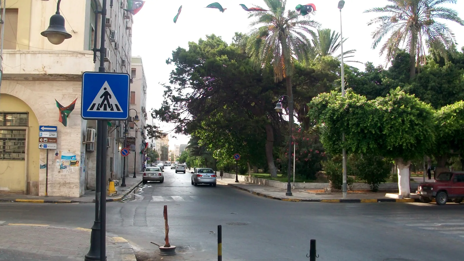 Palm-lined Baladiya Street and buildings in Tripoli, Libya