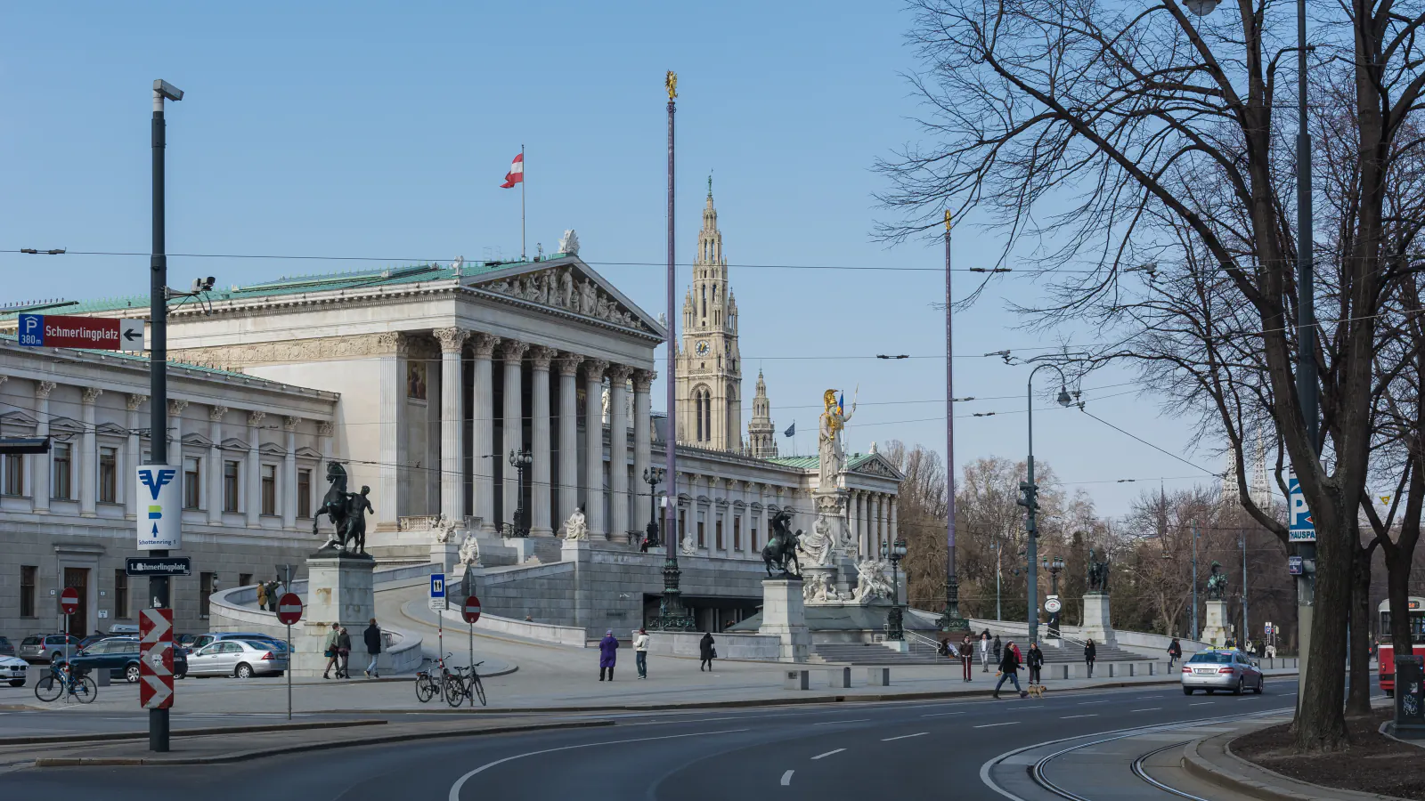 The Austrian Parliament building on the Ringstrasse, with the tower of Vienna’s Rathaus rising behind it