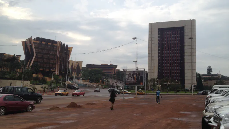 Yaoundé street and roundabout with buildings and greenery