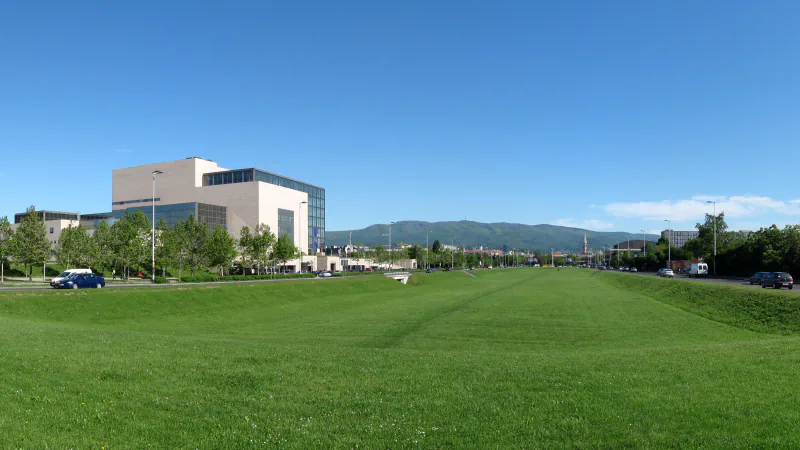 National and University Library, broad lawn and hills in Zagreb